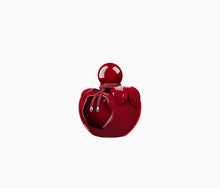 Load image into Gallery viewer, A bold, glossy, bitten red bottle of Nina Rouge Crush Eau de Parfum by Nina Ricci.
