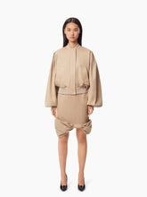 Charger l&#39;image dans la galerie, COTTON BOW PEPLUM MIDI SKIRT IN BEIGE - Nina Ricci
