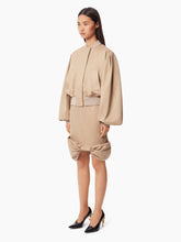 Charger l&#39;image dans la galerie, COTTON BOW PEPLUM MIDI SKIRT IN BEIGE - Nina Ricci
