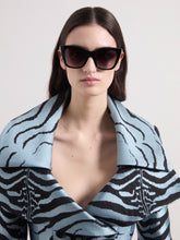 Charger l'image dans la galerie, Lunettes de soleil œil-de-chat oversize noires
