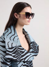 Charger l'image dans la galerie, Lunettes de soleil œil-de-chat oversize noires

