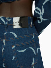 Charger l&#39;image dans la galerie, Bow-print exaggerated flare jeans in raw denim - Nina Ricci
