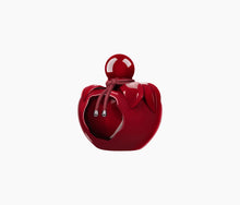 Load image into Gallery viewer, A bold, glossy, bitten red bottle of Nina Rouge Crush Eau de Parfum by Nina Ricci.
