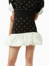 Charger l&#39;image dans la galerie, Polka dot peplum skirt in black - Nina Ricci
